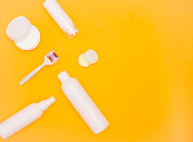 High angle view of yellow and knife on white background