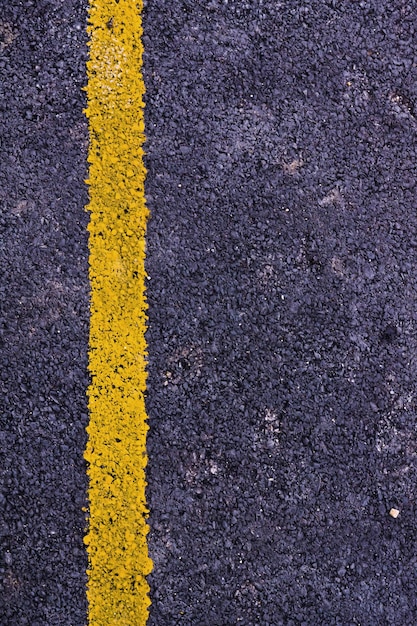 High angle view of yellow road sign on street