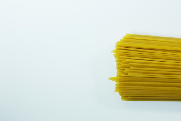 Photo high angle view of yellow stack against white background