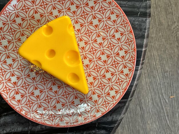 High angle view of yellow toy on table