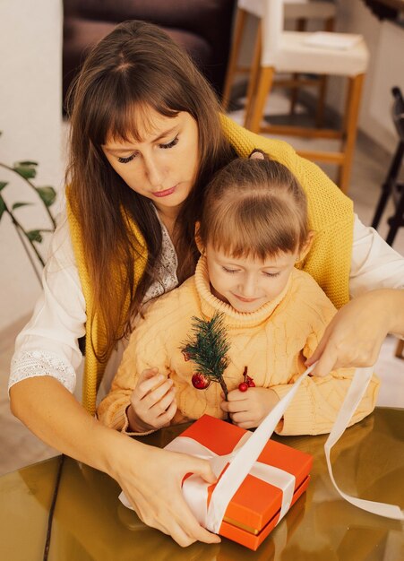 High angle view of young woman using digital tablet at home