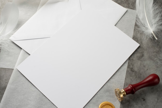 Photo high angle of wedding paper and envelope with seal