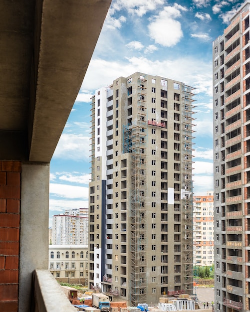 High buildings with scaffold at the construction site