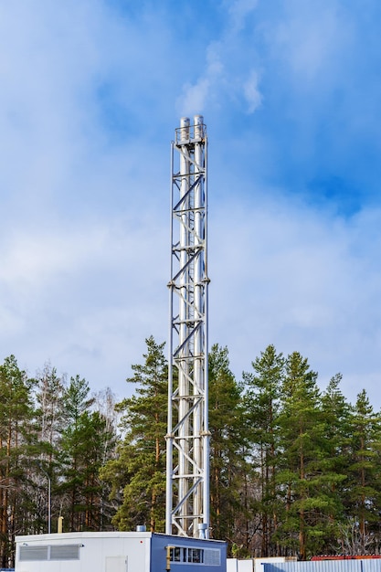 Photo high chimneys of the district gas boiler house modern technologies