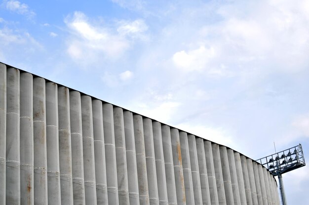 High corrugated metal fence