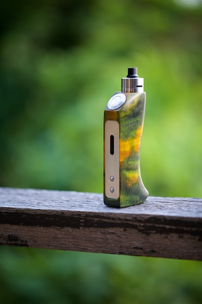 High end yellow green stabilized wood regulated box mods with rebuildable dripping atomizer