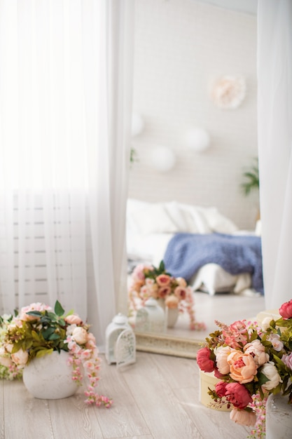 High mirror in a chic frame draped in white tulle