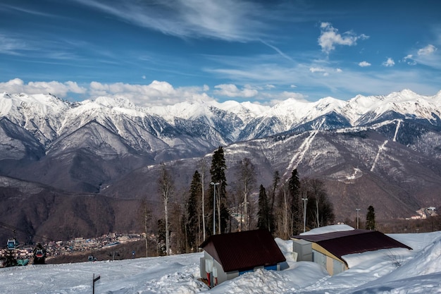 High mountain peaks covered with snow on a clear sunny day