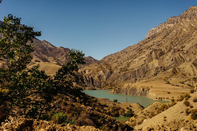 High mountains in the background of the river