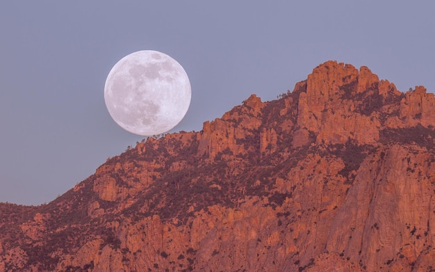 High mountains and big round moon wallpaper