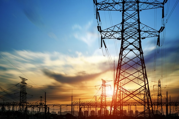 High pressure wire tower at sunset at dusk