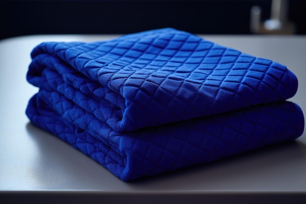 A high quality diamond patterned fancy texture bath towel in a lovely royal blue color made from 100