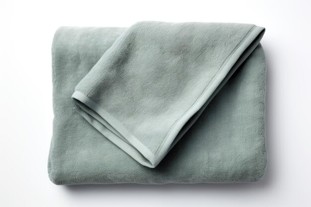 A high quality image of a folded towel with a soft texture placed on a white background captured fro