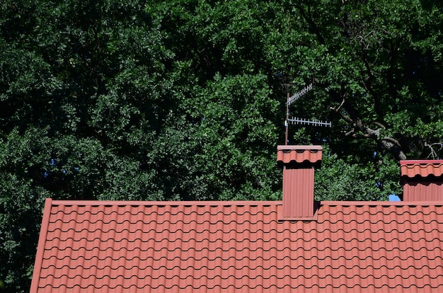 High quality red metal tile roof of a house