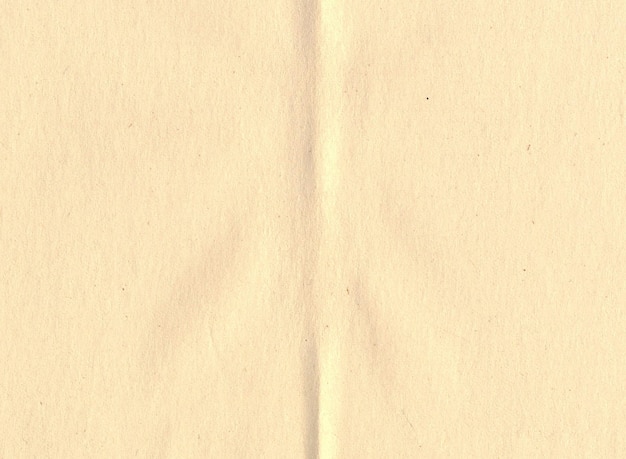 High res old thin weathered yellowed beige uncoated sketch paper texture background scan half folded