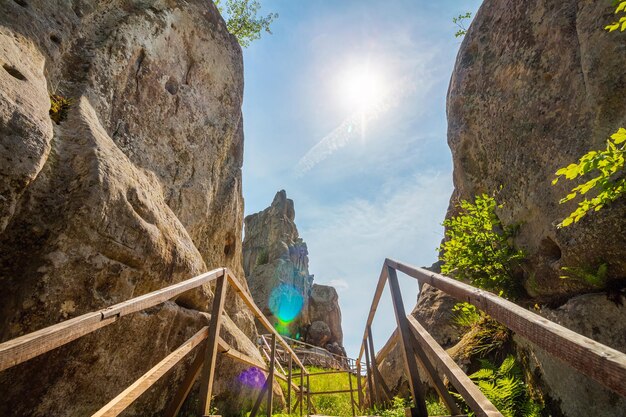 High rocks in the Carpathian mountains, nature landscape, ruins of Tustan fortress.