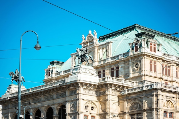 High section of built structure against clear blue sky