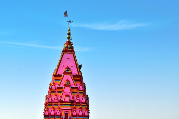 High section of temple against blue sky