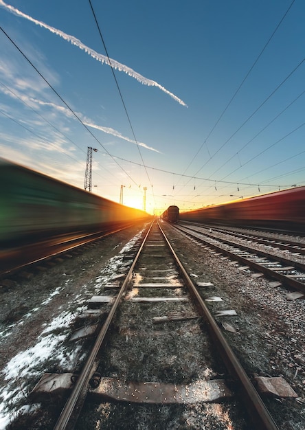 High-speed train moves by rail, delivery of goods by freight train. Train carriages at the station