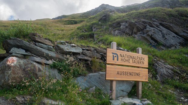 High Tauras National Park sign in alpine environment Austrian Alps Europe