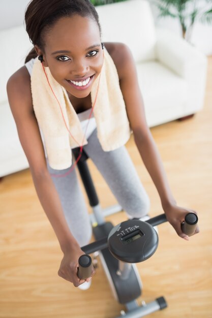 High view of a black woman on an exercise bike