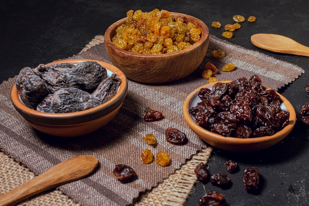 High view bowls full of dry fruits and nuts