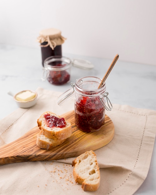 High view slices of bread and  wild berry jam