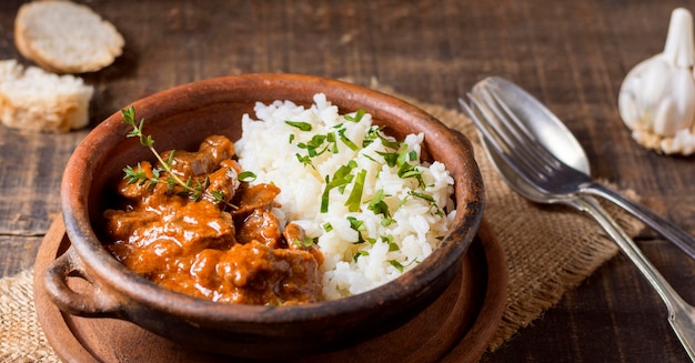 Photo high view winter food stew and rice