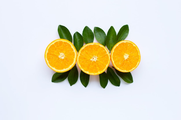 Photo high vitamin c. fresh orange citrus fruit with leaves isolated on white.
