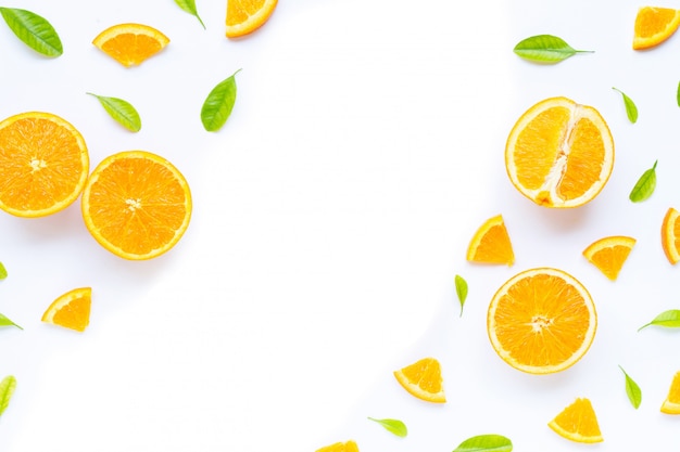 High vitamin C, Juicy and sweet. Fresh orange fruit with green leaves on white background