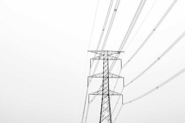 High voltage electricity transmission tower under the foggy sky in the evening with copy space