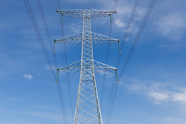 high voltage power line on metal poles