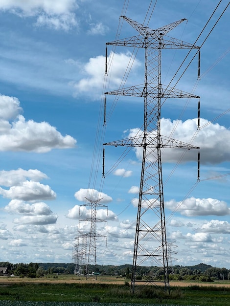 High voltage pylon in the field energy distribution and supply\
between cities in rural areas concept