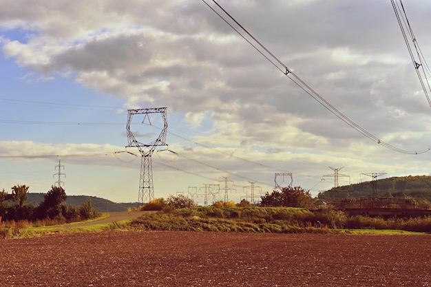 High voltage pylons. Rising energy prices - a concept for industry and energy. Increasing the price.