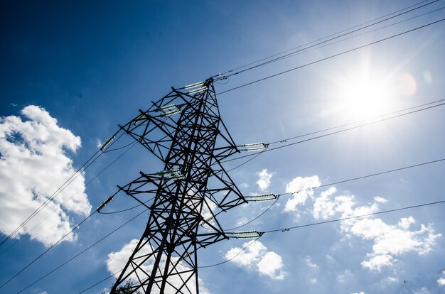 High voltage tower with sky.