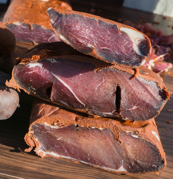 Highly seasoned airdried cured beef