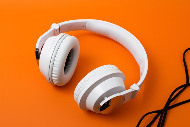 Highquality headphones on a orange background Headphone product photo