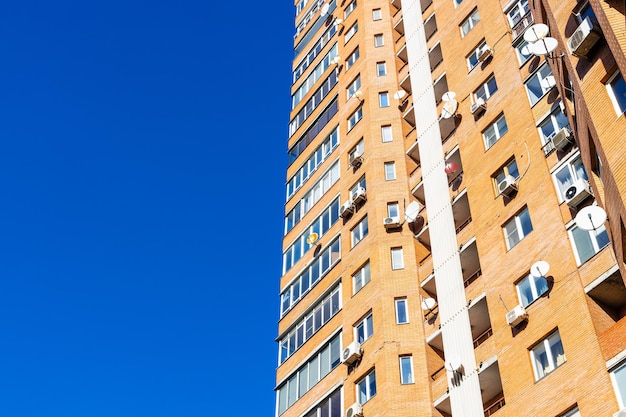 Highrise apartment house and blue sky