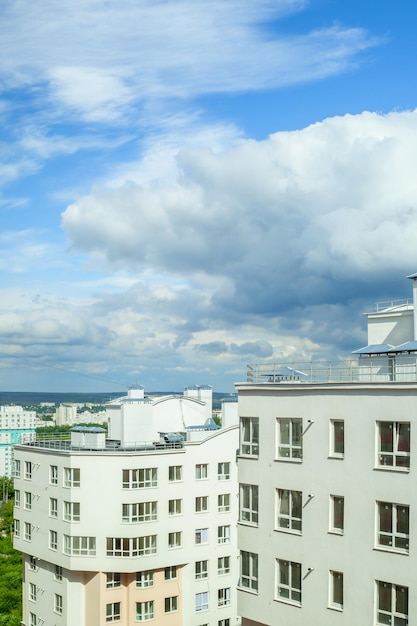 Highrise buildings against the blue sky