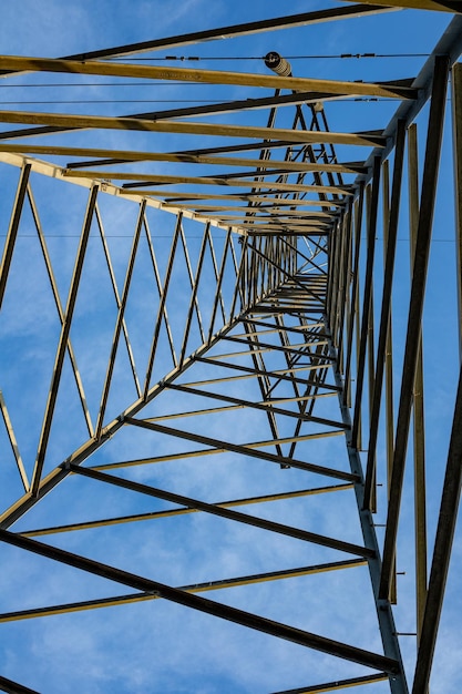 Hightension transmission tower up view vertical photo