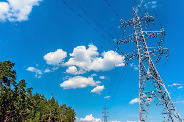 Highvoltage lines against the blue sky