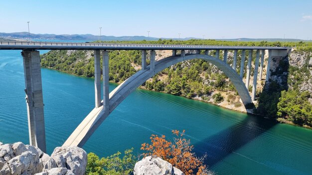 Highway Krka Bridge over the Krka river town of Skradin in background Croatia