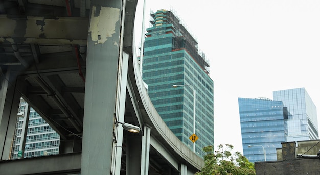 Photo highway overpass under golden sunset symbolizing urban connectivity and modern transportation infra