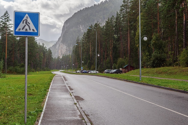 Highway section with parking near Tavdinsky caves during the rain