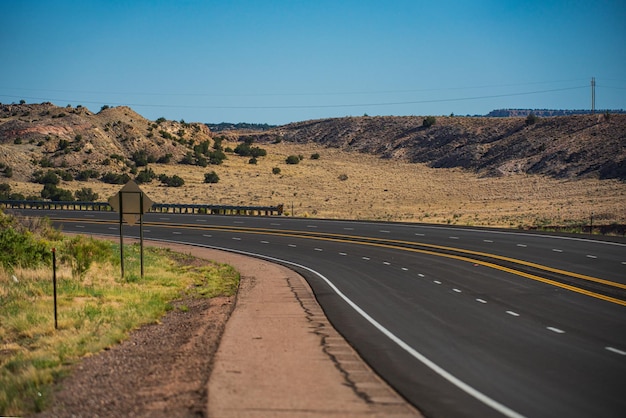 Highway on travel vacation western utah countryside highway during hot summer day