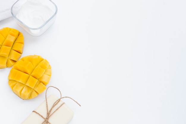 Hign angle of body butter cream and mango