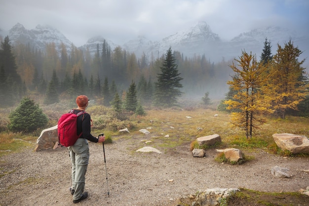 Hike in the autumn mountains. Fall season theme.