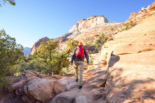 Hike in the Utah mountains. Hiking in unusual natural landscapes. Fantastic forms sandstone formations.