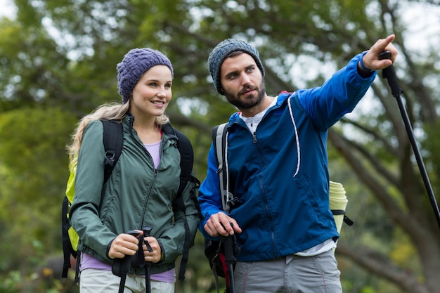 Hiker couple pointing at distance