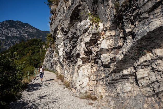 Hiker in the pathway of the Mount Cumieli ring, Friuli Venezia Giulia